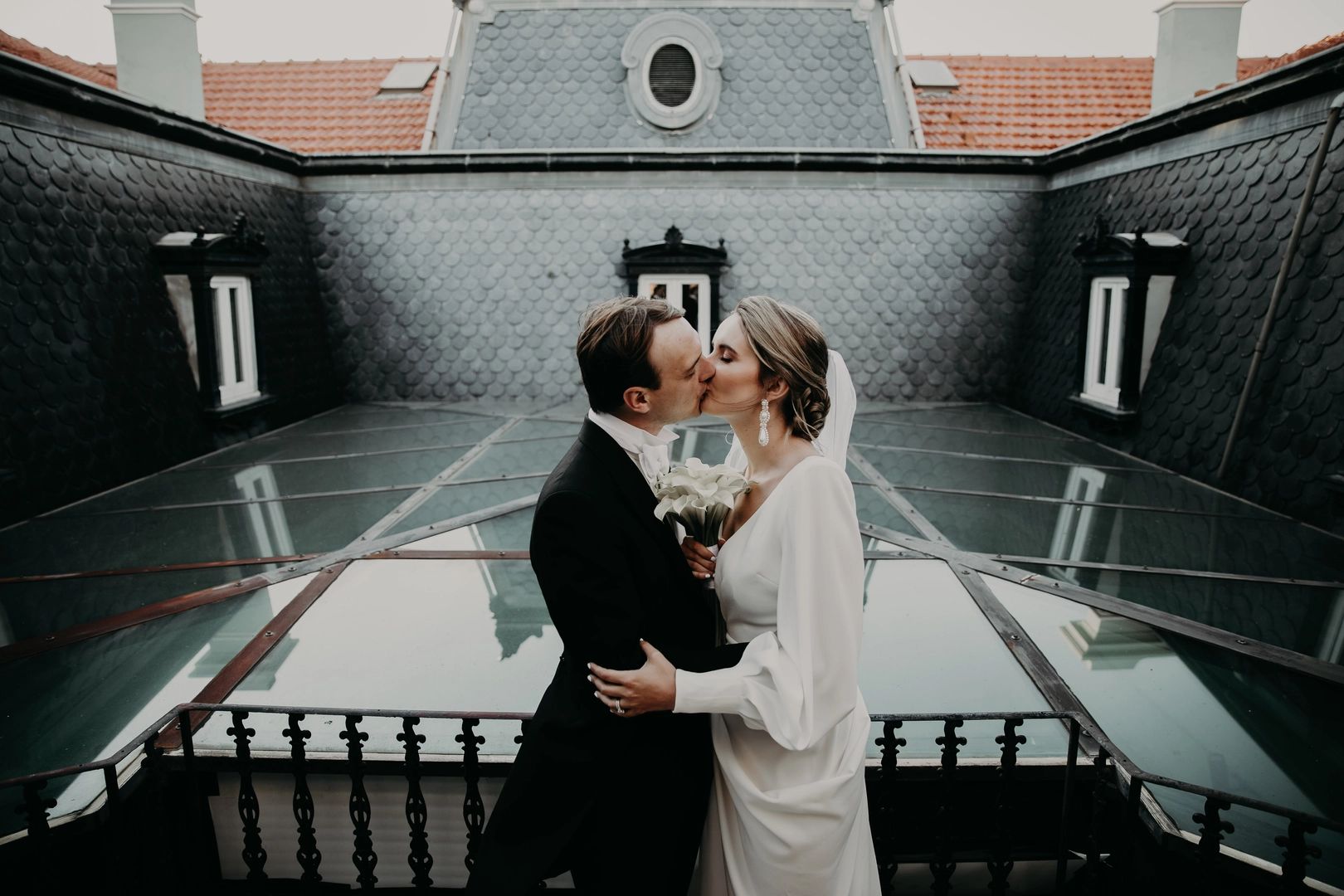 Bride and groom kissing after their ceremony for their destination wedding in Portugal