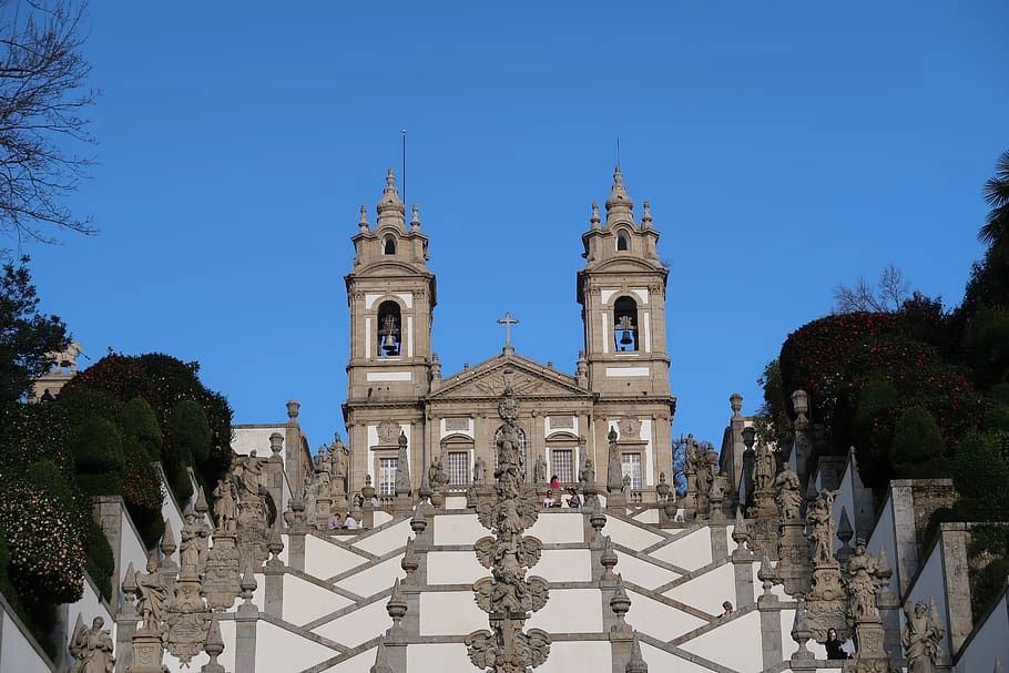 A facade of a Catholic church in Braga, Portugal with medieval features