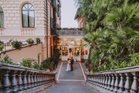 Couple posing in a boutique hotel for their elopement in Italy