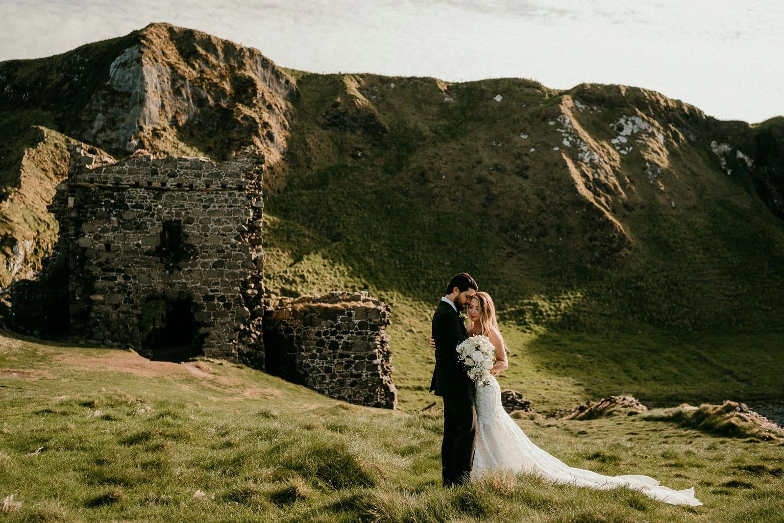 Scenic cliffs with a castle ruin in Northern Ireland