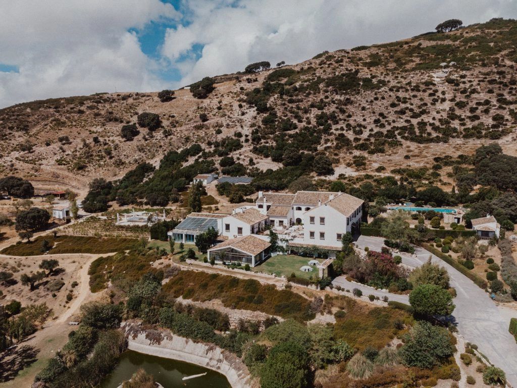 A rustic, medieval hotel surrounded by mountains and countryside views for destination weddings in Spain.