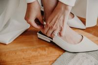 Flat white bridal shoes for an adventure elopement in Portugal