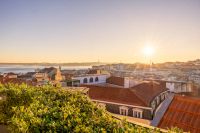 Aerial view of Lisbon, a popular location for destination wedding in Portugal, at sunset