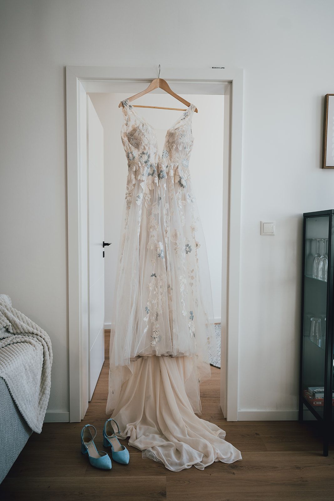 A bride's wedding dress hanging for a micro wedding in Germany