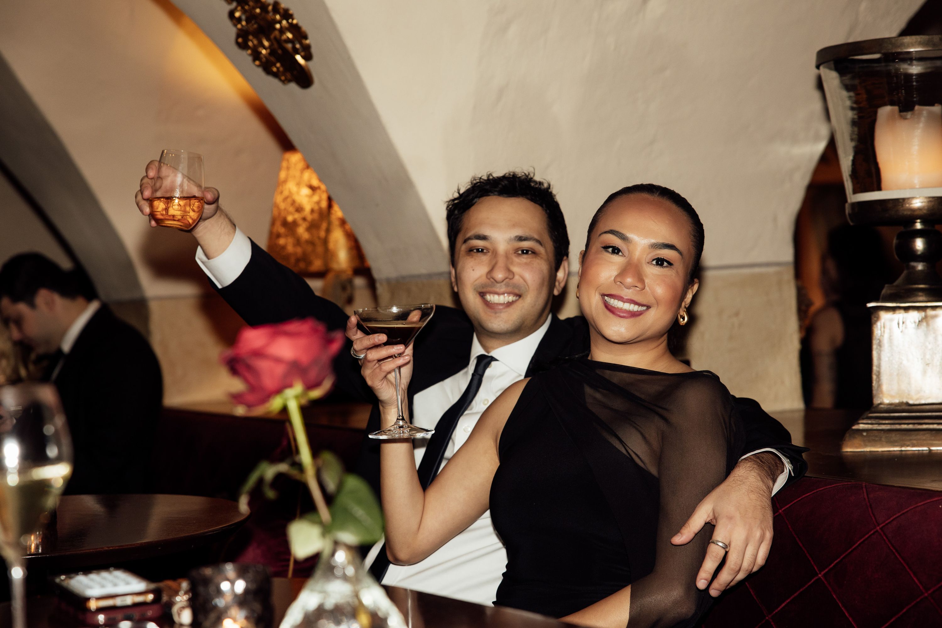 Guests raise glasses for a celebratory toast during the reception of a small wedding in Austria
