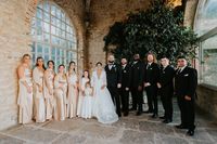 Bride and groom with their entourage having a photoshoot during their vow renewal in portugal
