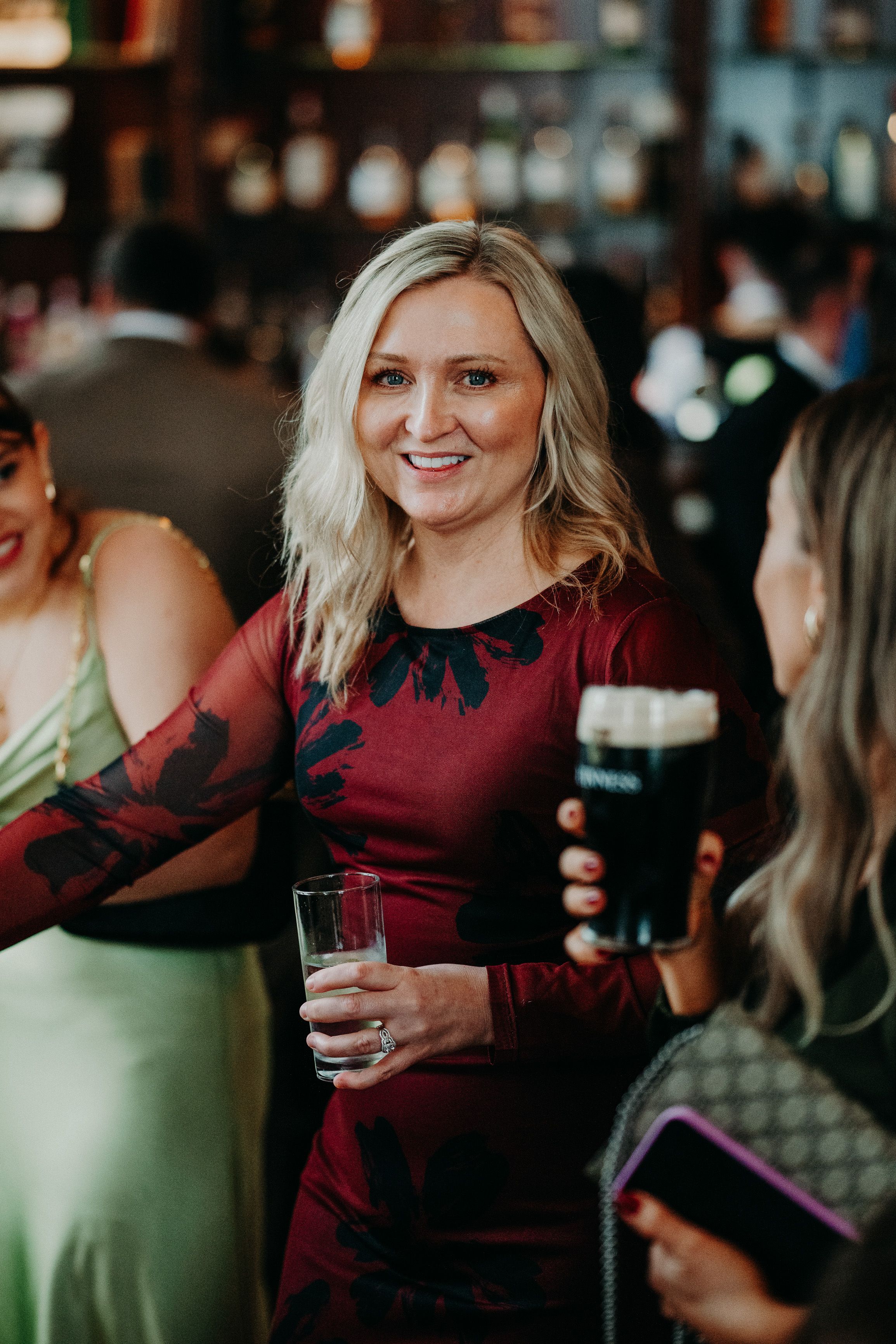 Wedding guest smiling during the reception at an intimate wedding in Ireland