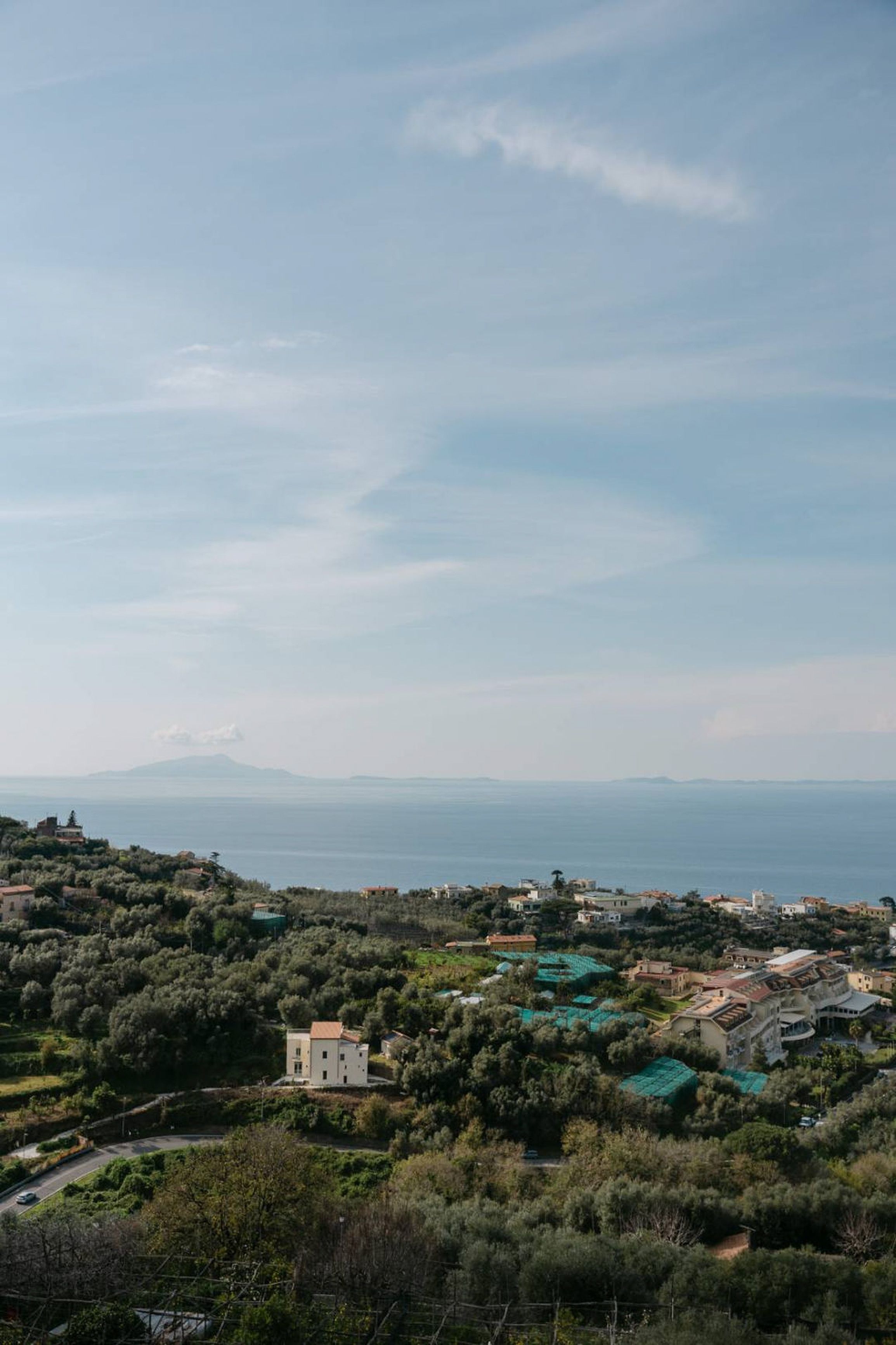 Coastal hillside and sea view overlooking the venue for a small wedding in Italy