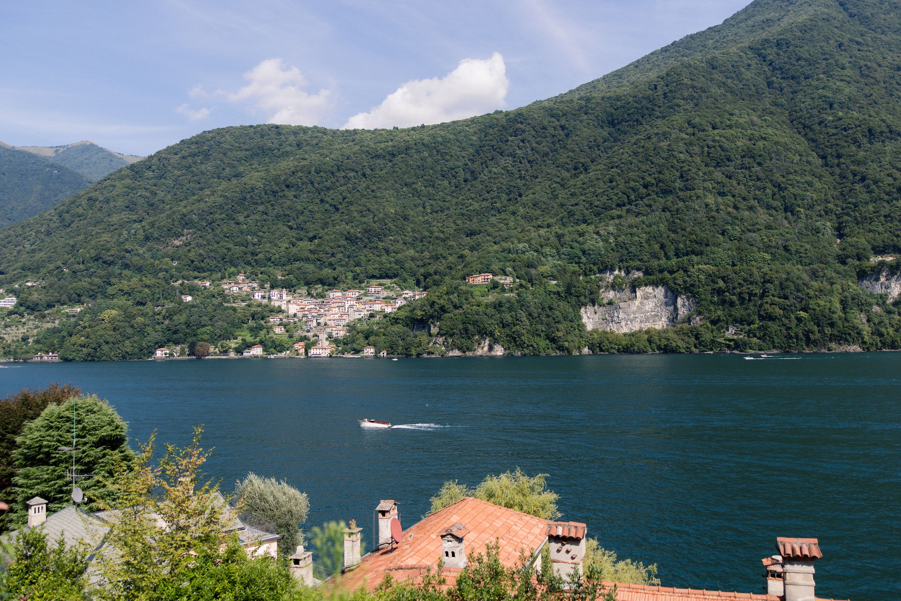 Panoramic Lake Como landscape with mountains and lakeside village near an intimate wedding in Italy