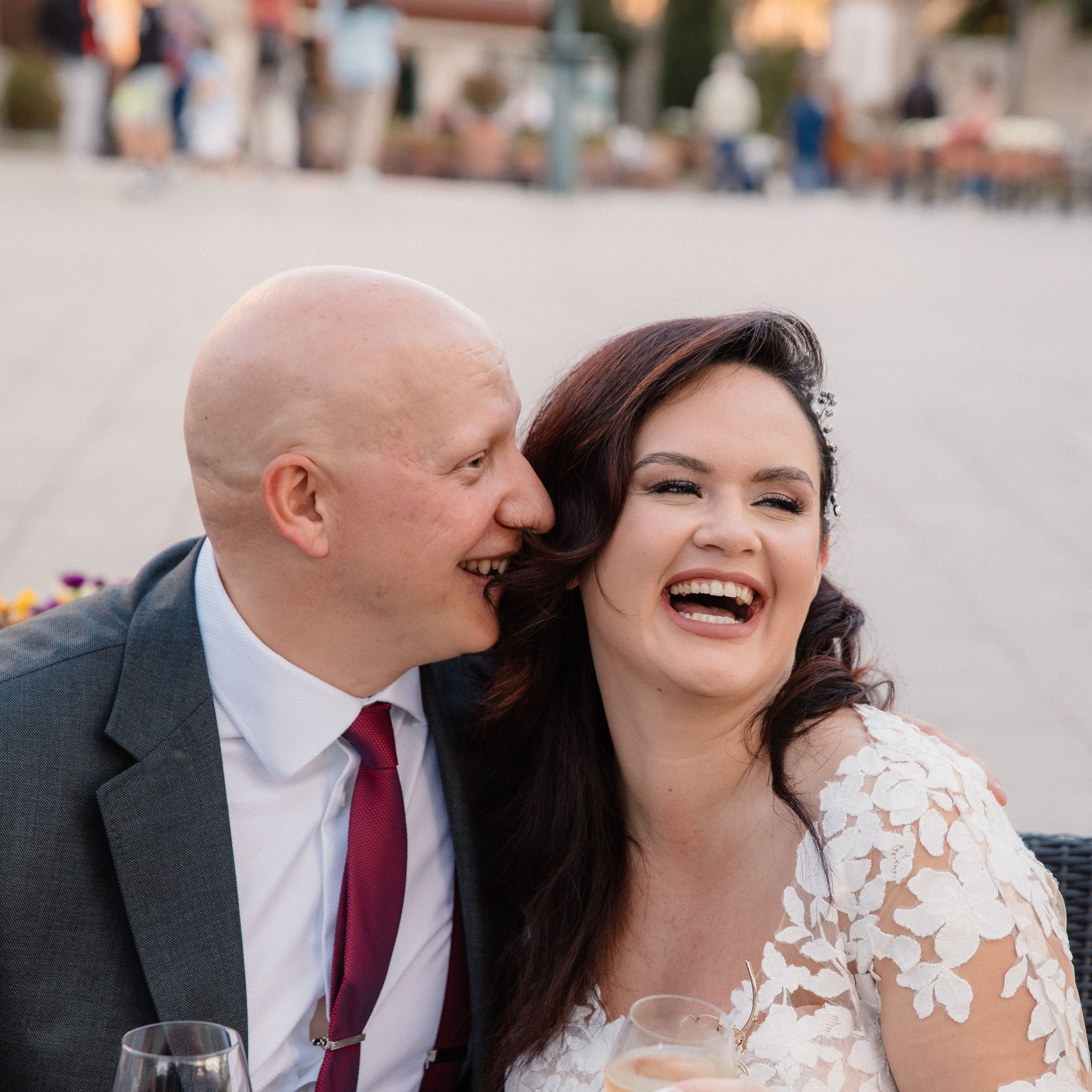 Bride and groom laughing on their wedding day in Italy