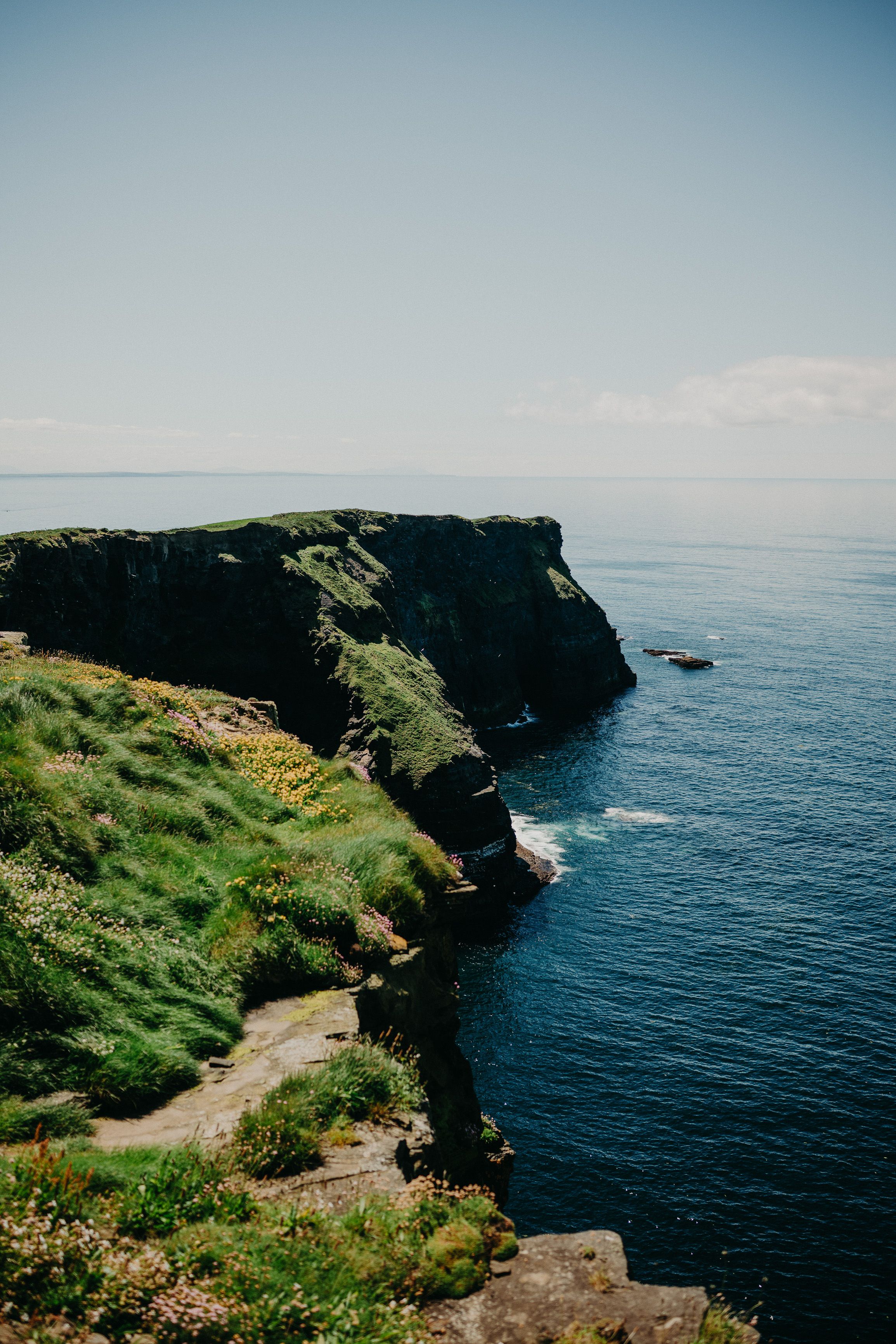 A beautiful cliff with grass and flowers for an intimate wedding in Ireland