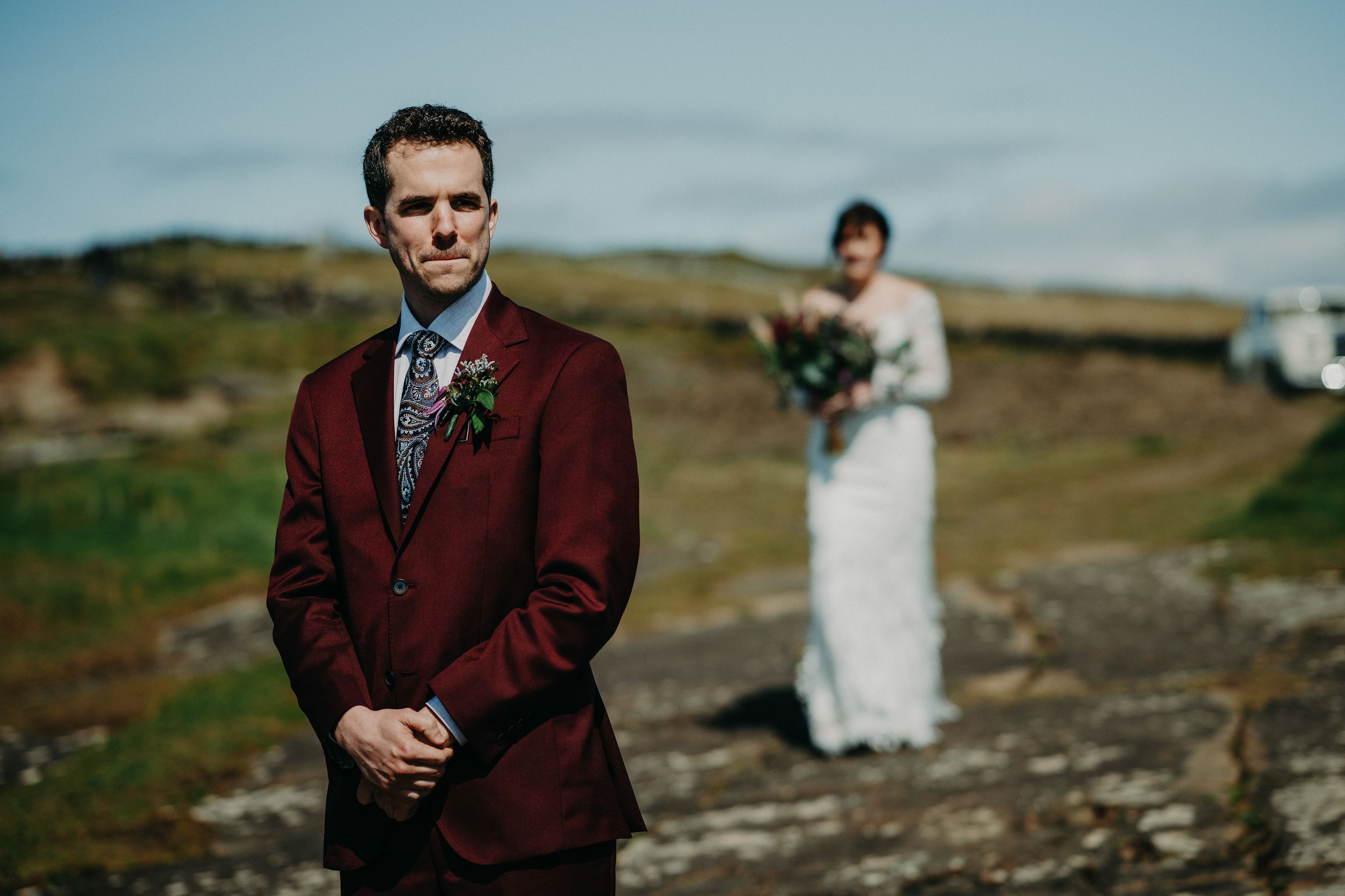 A groom about to see her bride for the first time during their elopement in Ireland
