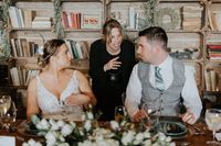 Wedding planner in Portugal talking to bride and groom on thei wedding day