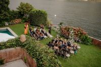 An outdoor ceremony of an Italian destination abroad at the garden of a villa along Lake Como