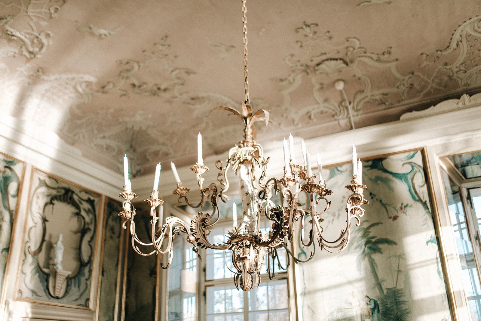 Candle chandelier in a hand-painted salon of an Austrian palace