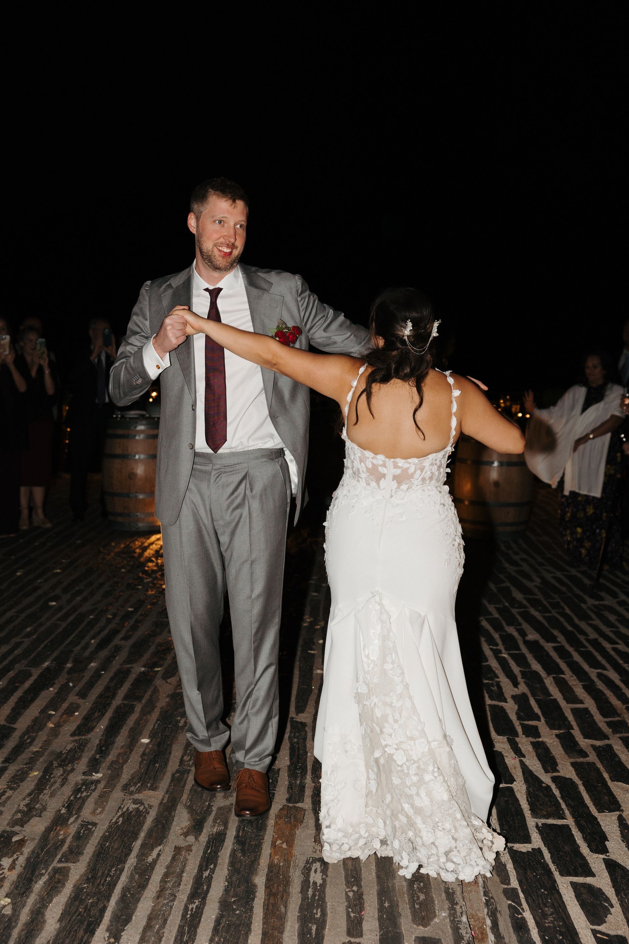 Bride and groom dance during the night of the party of their micro wedding in Portugal