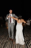 Bride and groom dance during the night of the party of their micro wedding in Portugal