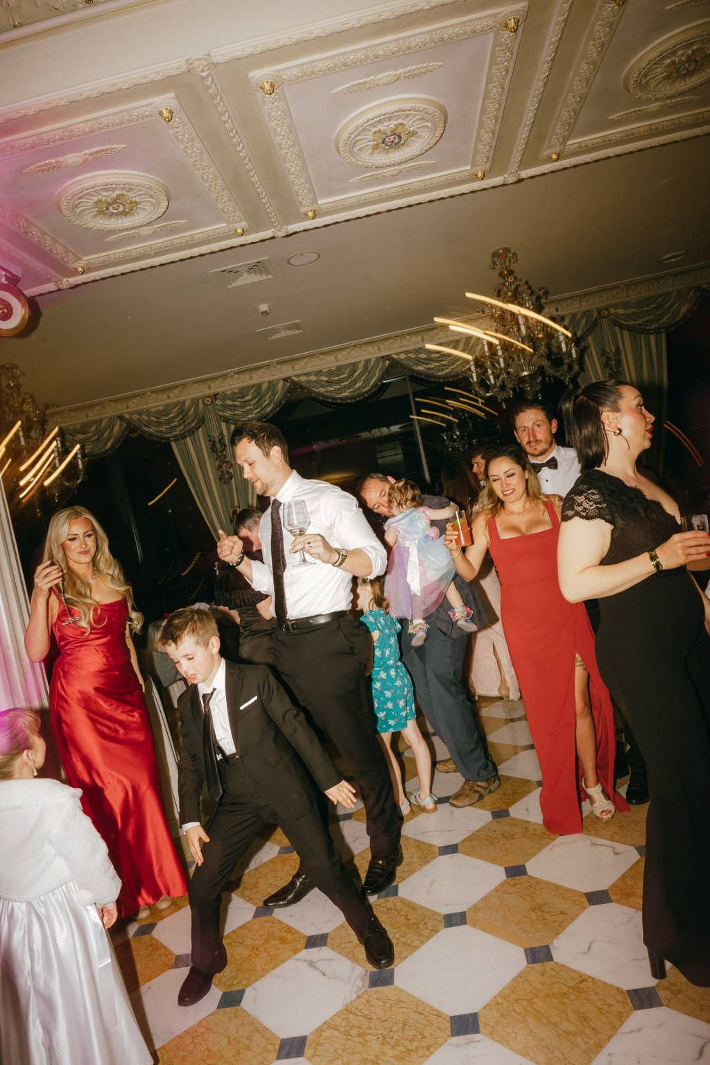 Guests dancing and celebrating together at an intimate wedding in Italy reception party