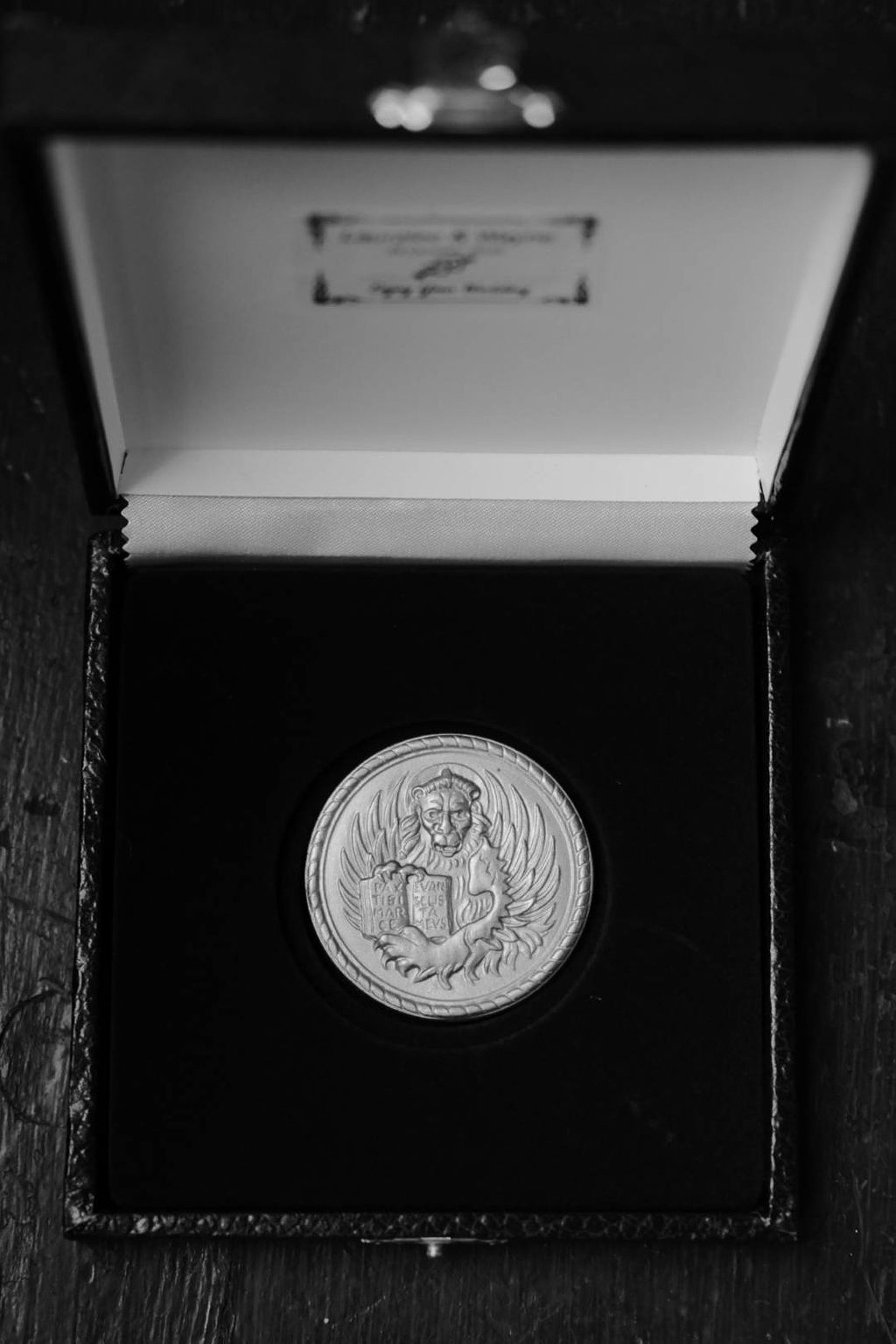 A piece of iron coin as Toc Ferro for a wedding in Italy