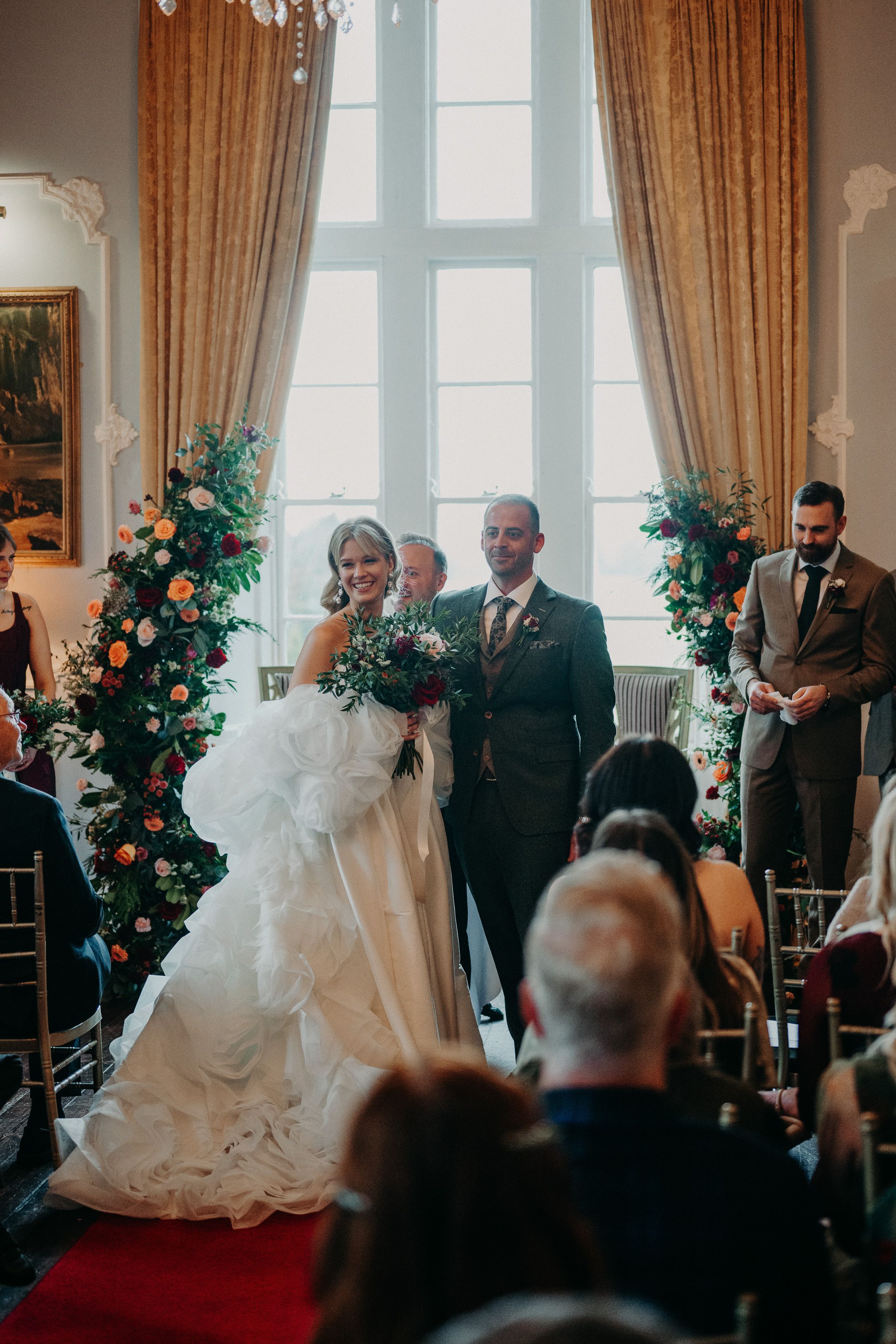 Guests gathered for a romantic castle ceremony during a small wedding in Ireland
