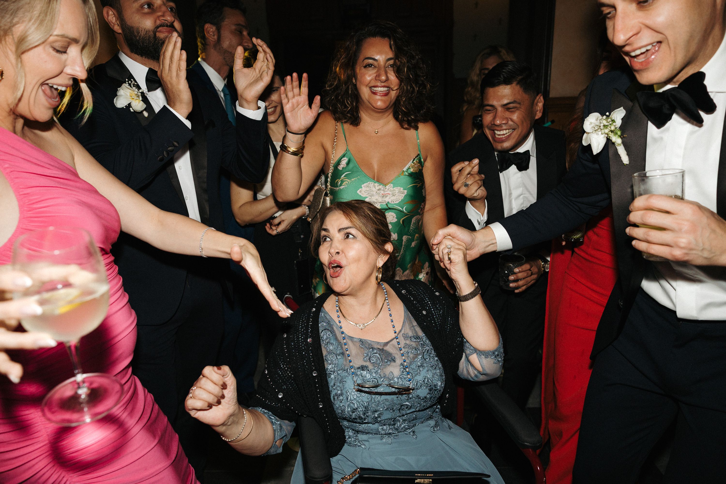 Wedding guests celebrating and dancing during a small wedding in Portugal reception