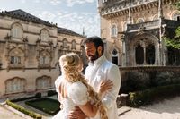 Bride and groom posing for photo at a wedding in Portugal