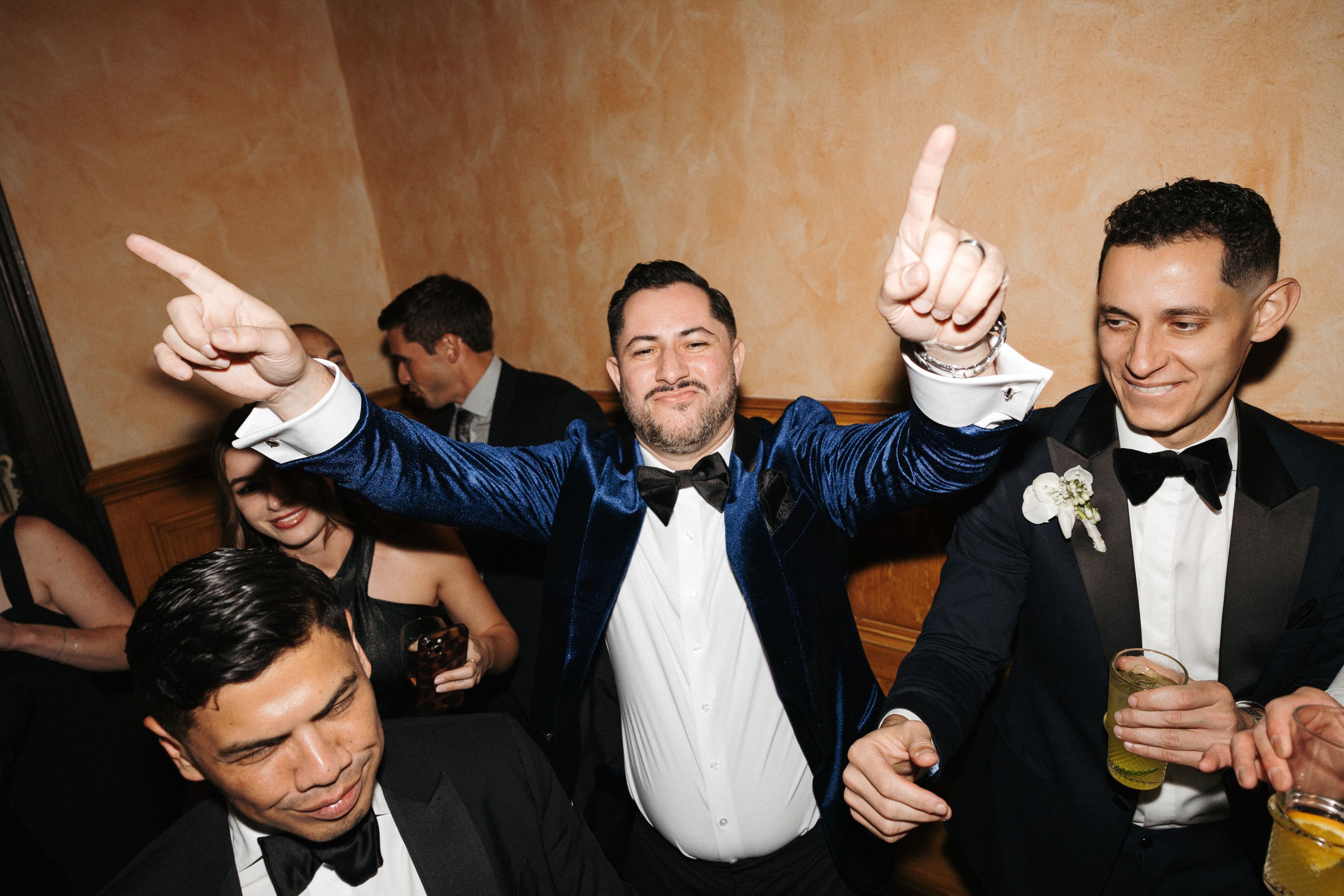 Family and friends dancing together at an intimate wedding in Portugal celebration