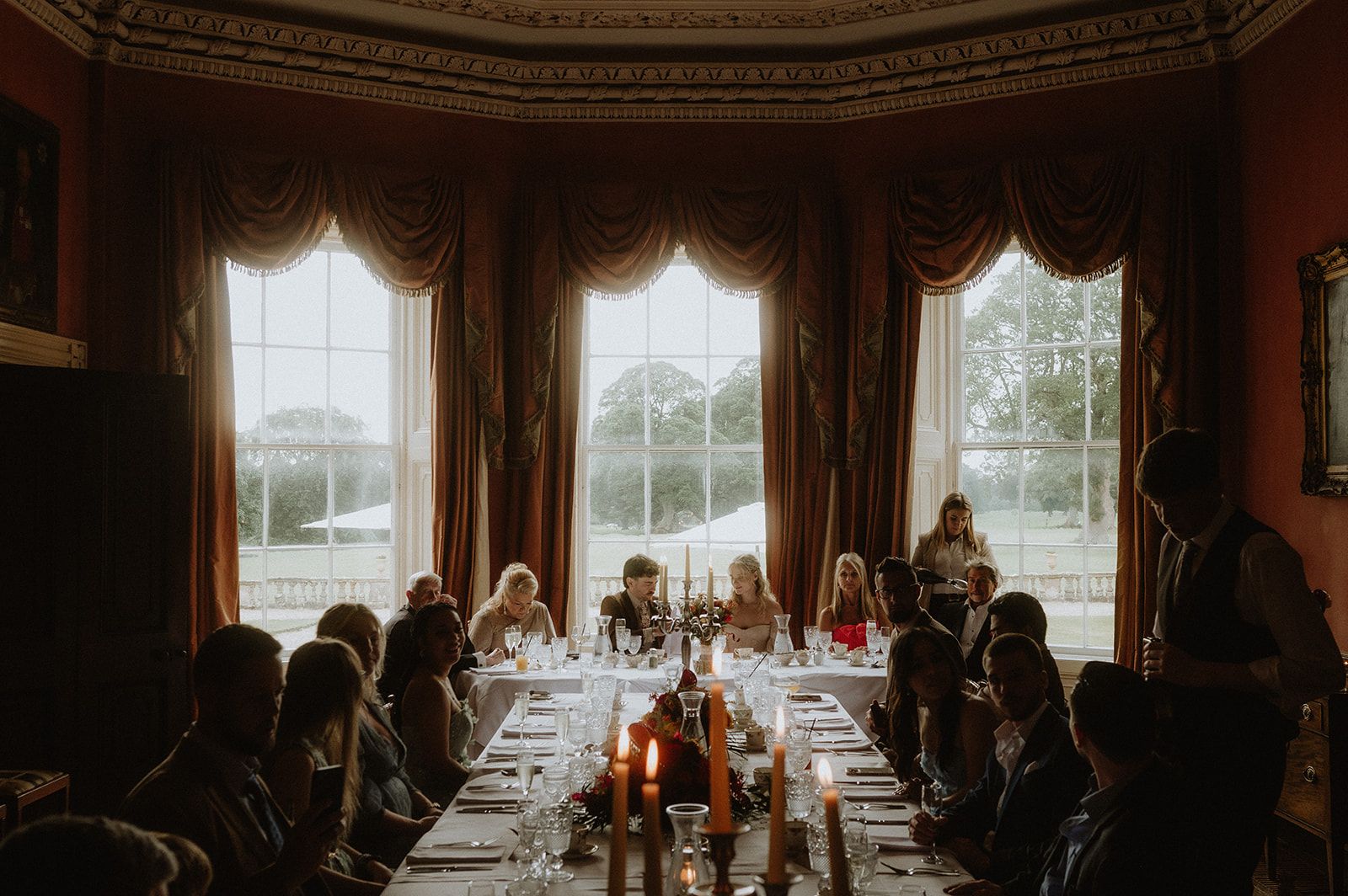 An indoor reception in a mansion in Londonderry during an Irish wedding abroad