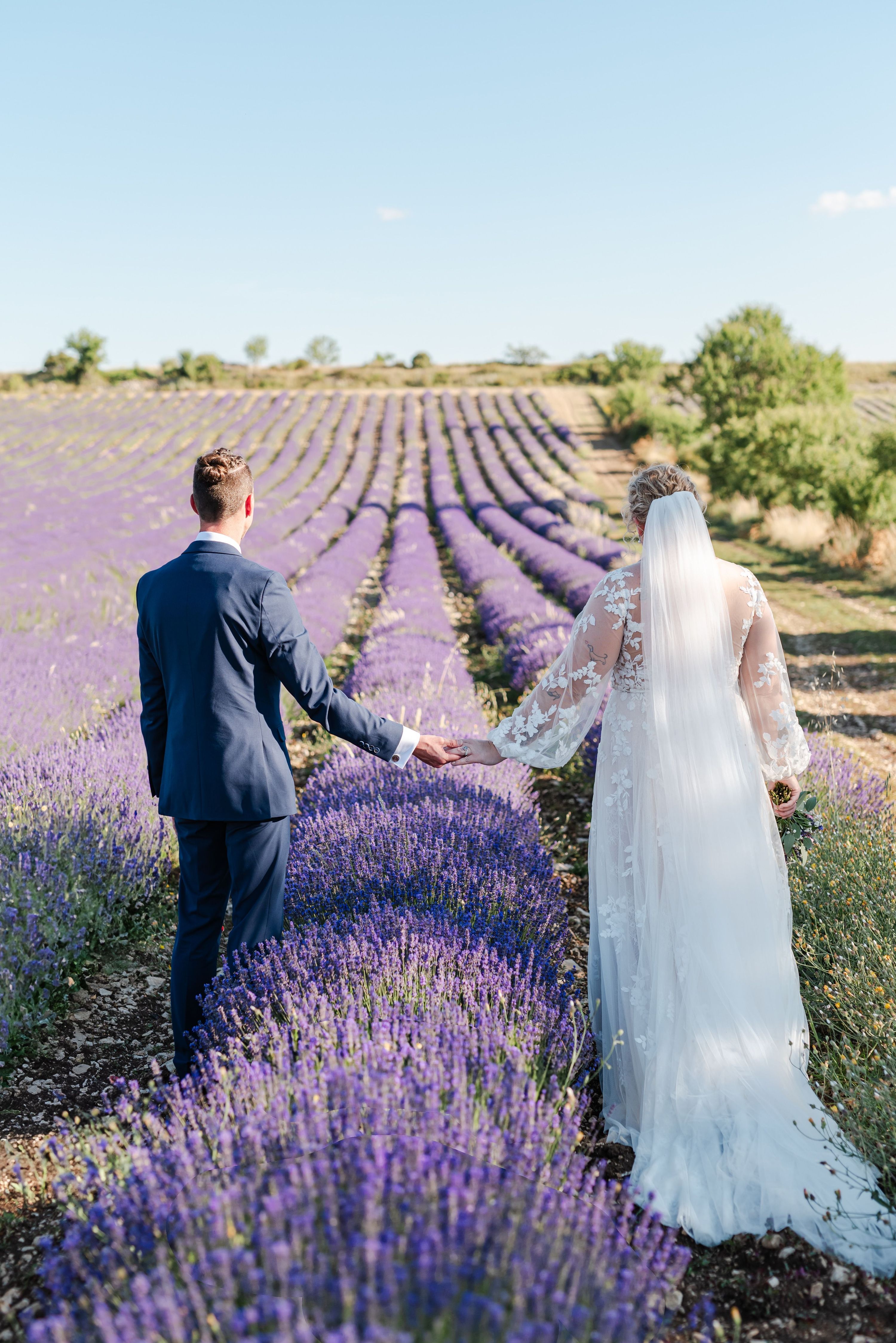 Bride and groom eloping in the lavender field of Provence, France