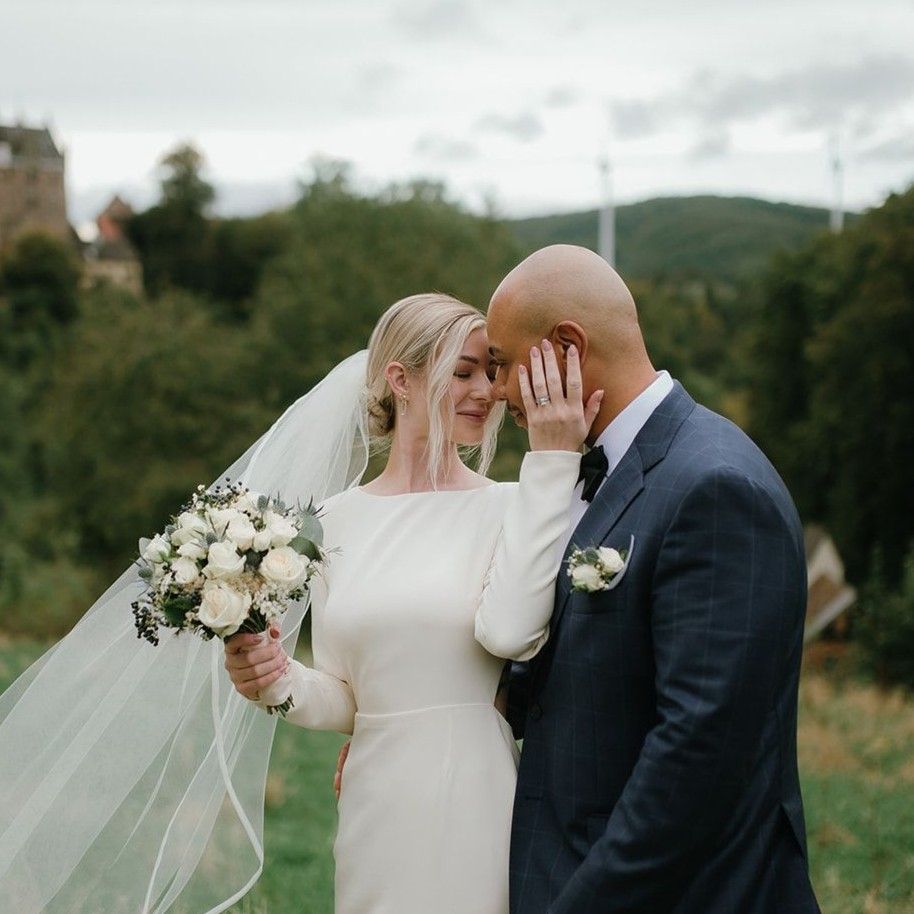 Bride and groom posing for a photo on their wedding day in Germany