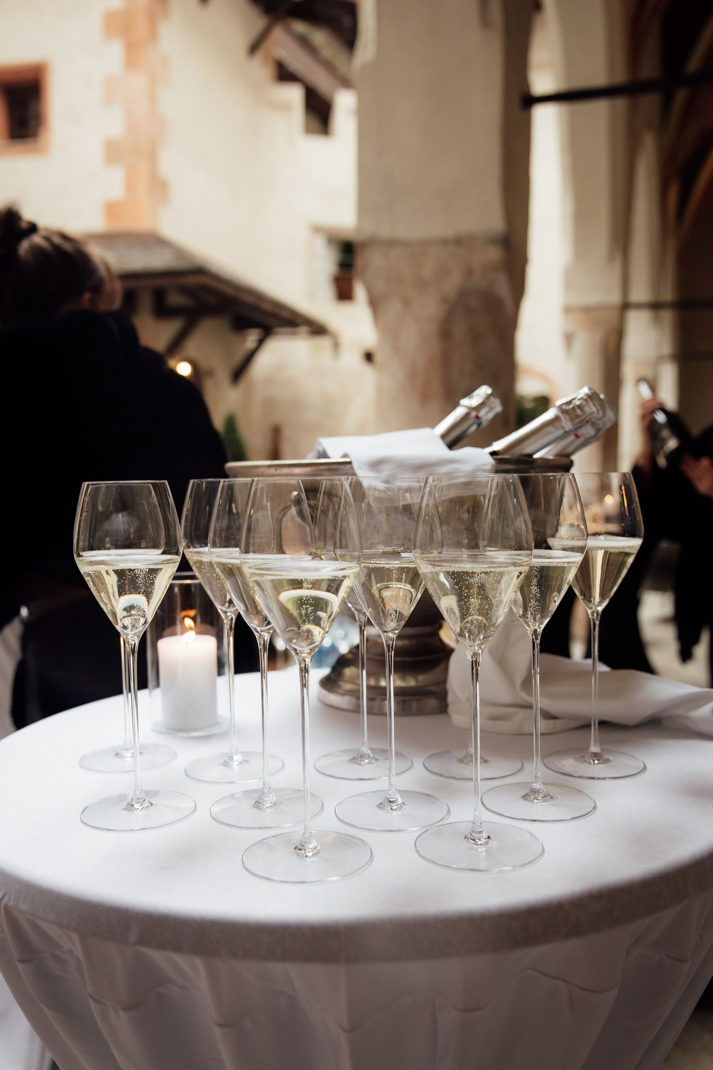 Champagne glasses arranged for guests during the reception of a small wedding in Austria