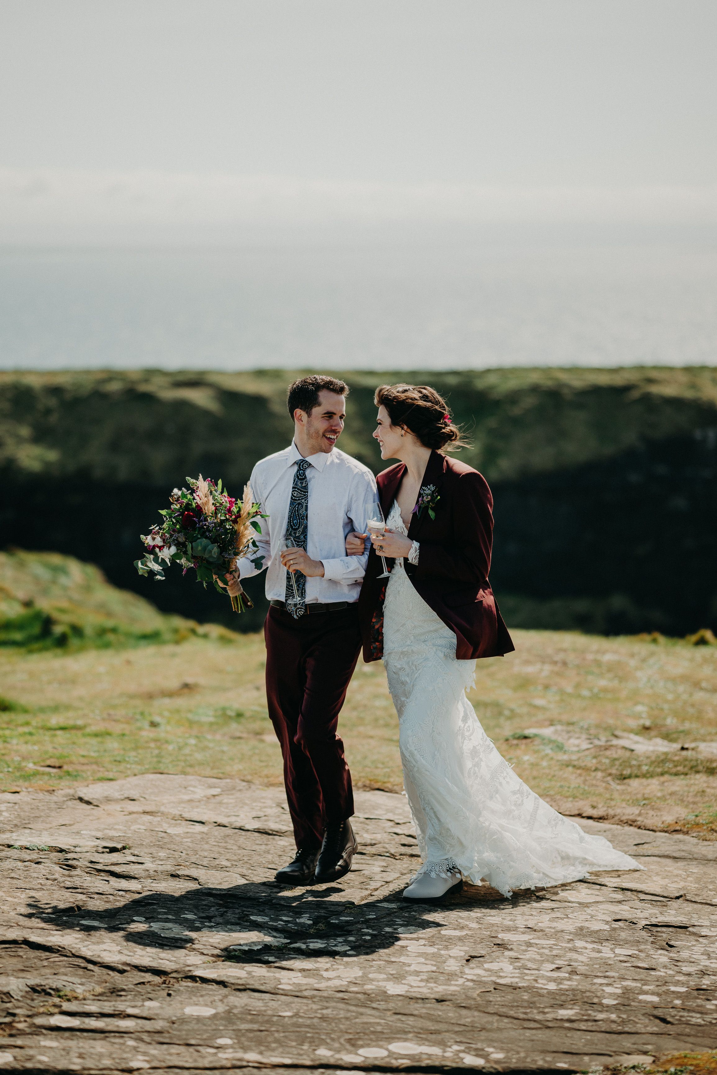 A bride and groom having a fun moment after their intimate wedding in Ireland