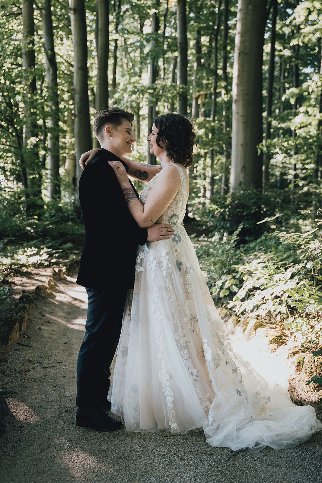 A bride and groom set in a forest in Germany for their intimate wedding