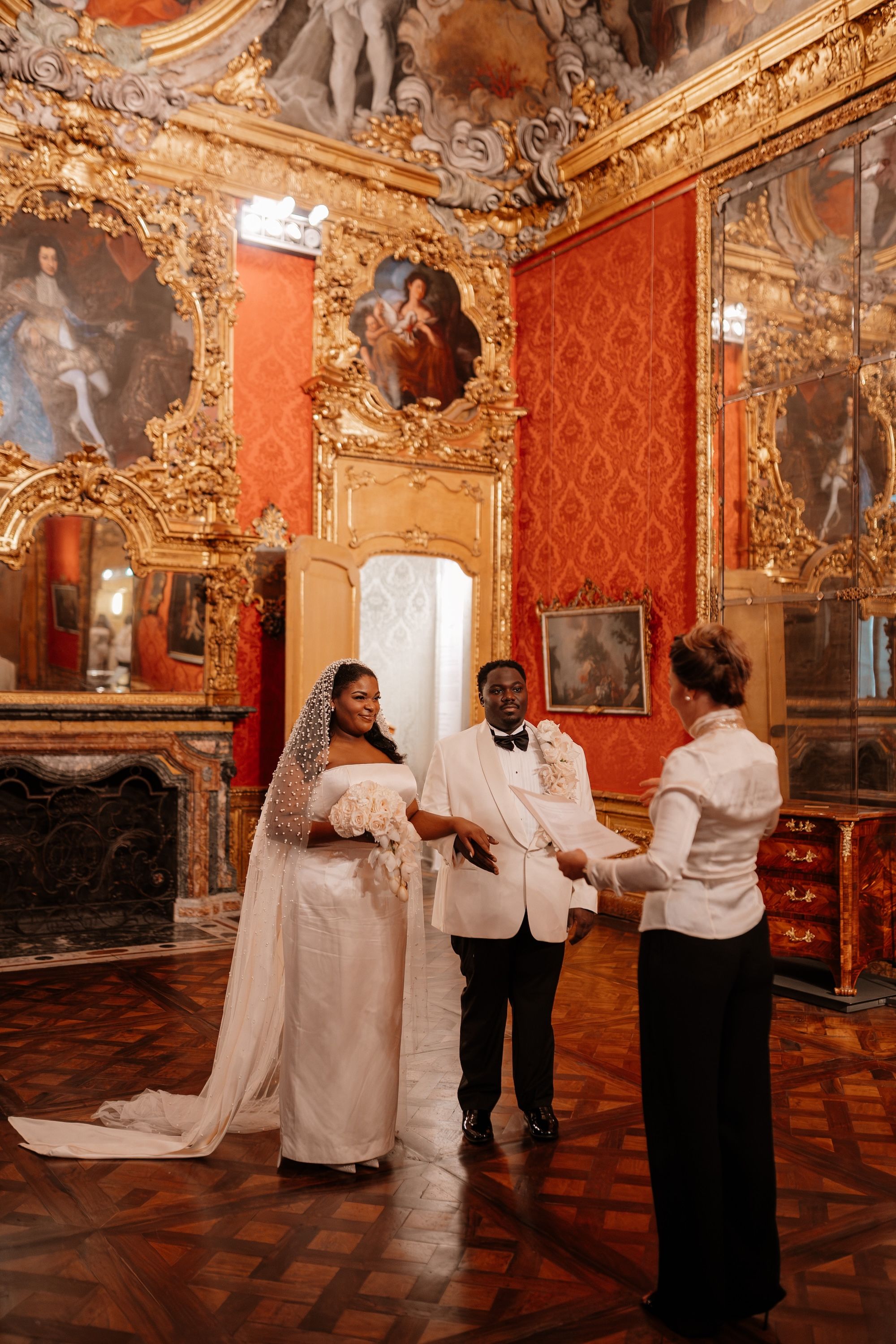 Bride and groom having a wedding ceremony inside a museum in Turin during their elopement in Italy