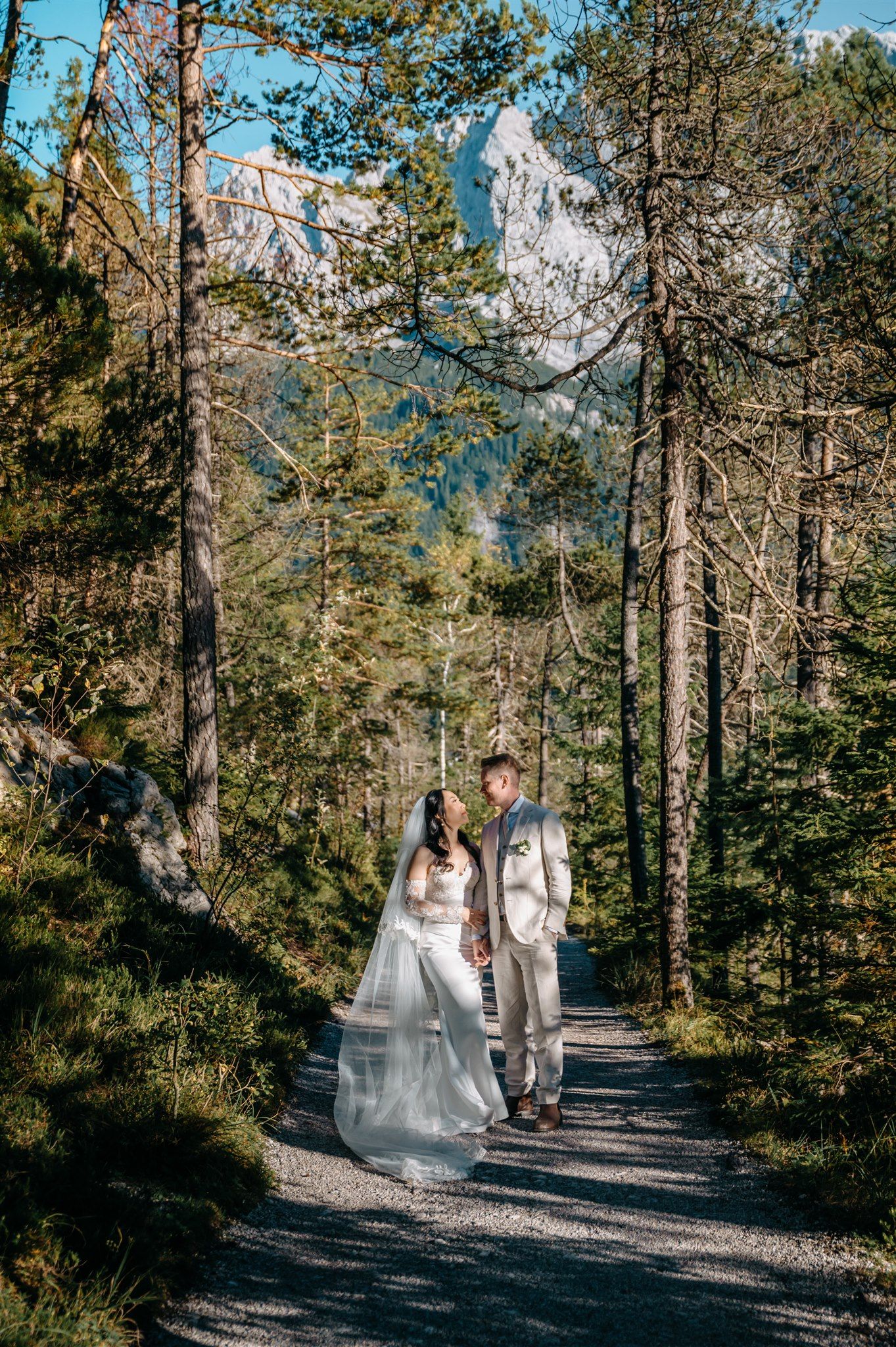 A bride and groom standing next to each other during Autumn in Bavaria for their intimate wedding in Germany