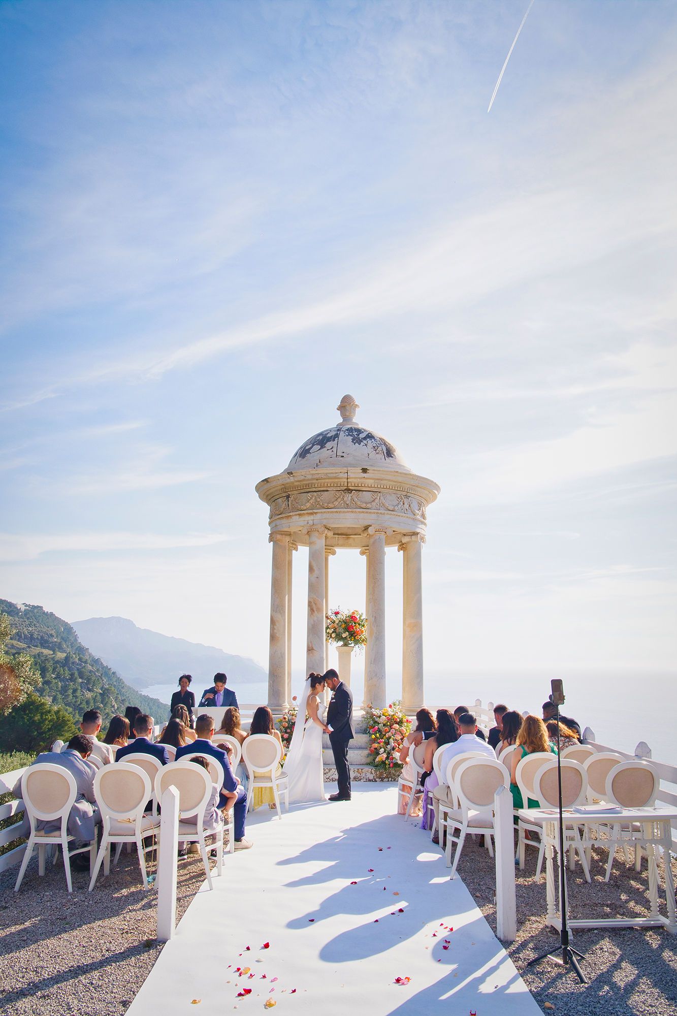 Mallorca's clear skies, mountains, and the Mediterranean Sea make up the backdrop of a micro wedding in Spain