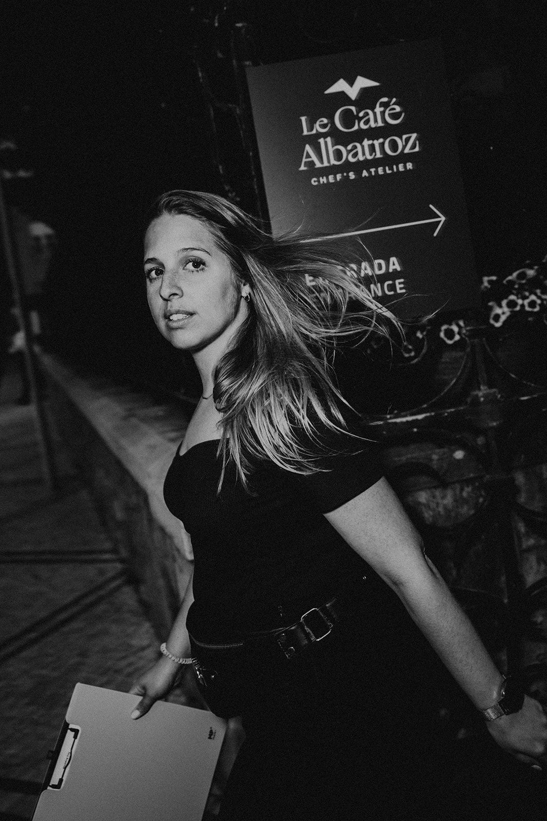 Destination wedding planner in Portugal walking out of a wedding venue at night