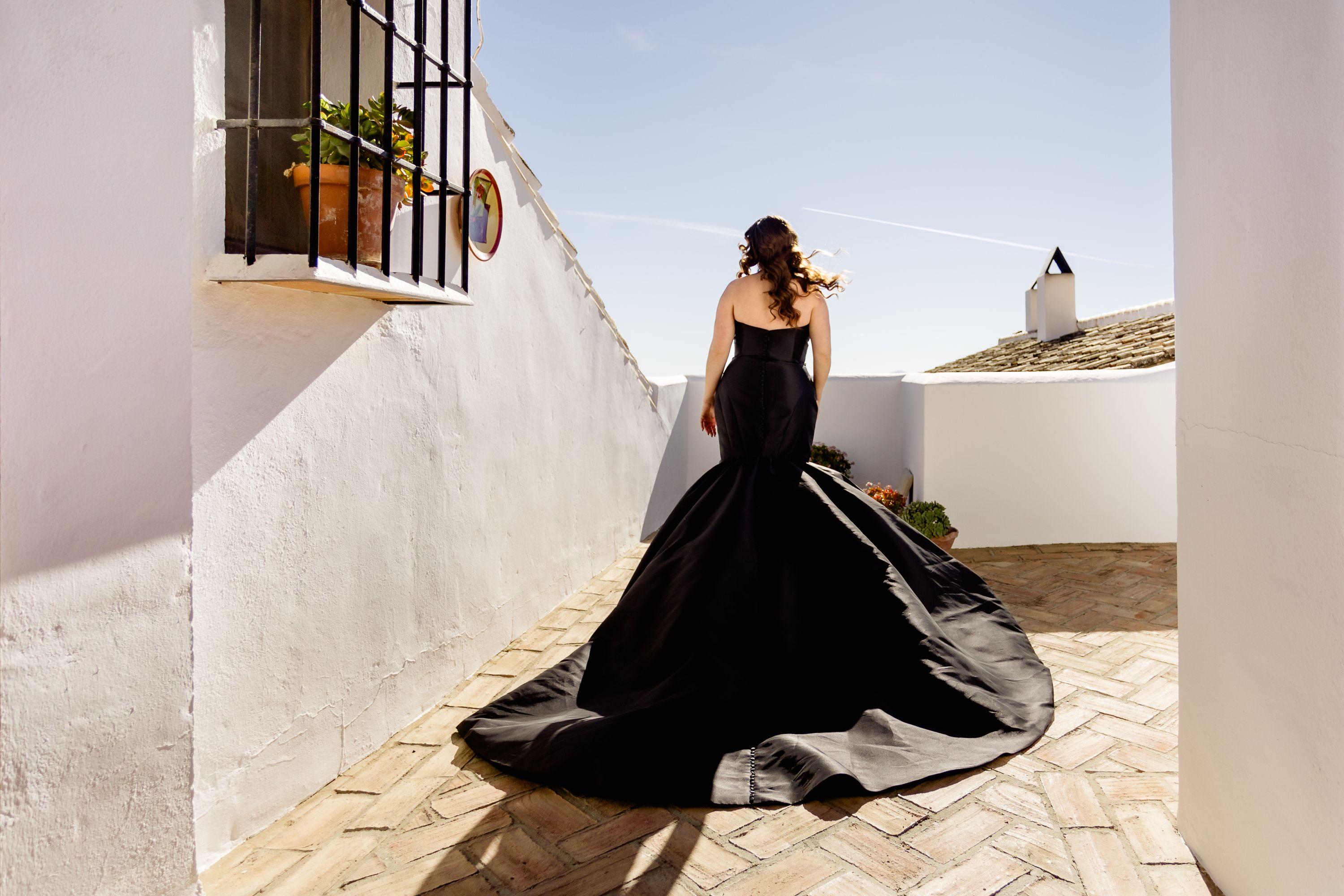 black wedding dress on a sunny day