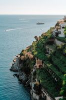 Hilltop hotel perched above the Amalfi Coast in Campania, with clear Mediterranean waters below during an elopement in Italy