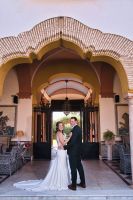 Bride and groom having a quick photoshoot in a farmhouse in Cadiz during their destination wedding in Spain