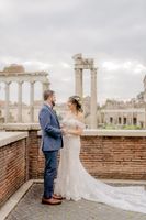Newlyweds holding hands after the ceremony of their Italian elopement in Rome