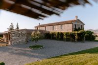 Rustic country house in Siena, Tuscany with a pergola and rolling hills backdrop for Italian weddings abroad