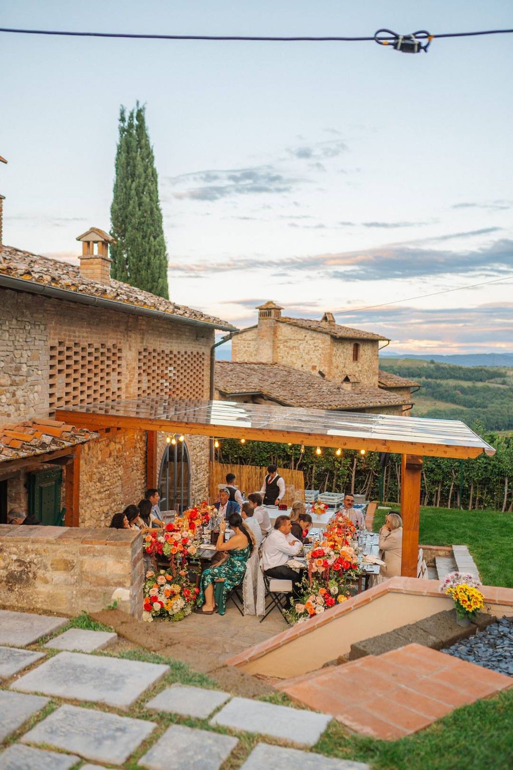 An intimate wedding happens in a Tuscan farmhouse overlooking the Chianti vineyards