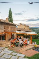 An intimate wedding happens in a Tuscan farmhouse overlooking the Chianti vineyards