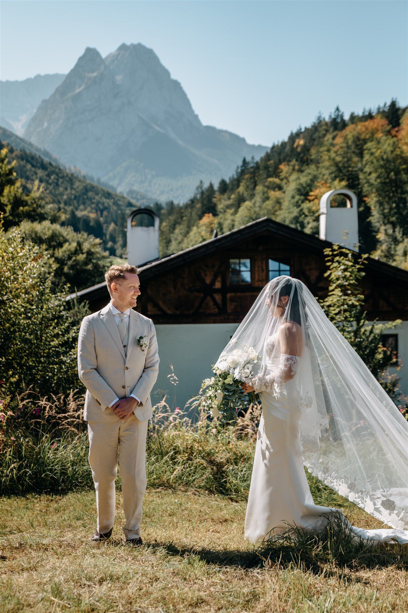 A groom getting a first look of his bride during their intimate wedding in Germany