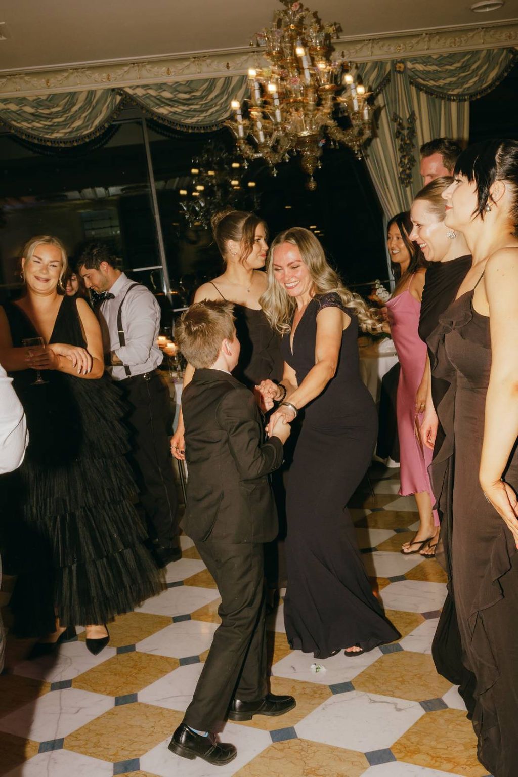 Guests enjoying the dance floor and celebrating at a small wedding in Italy reception