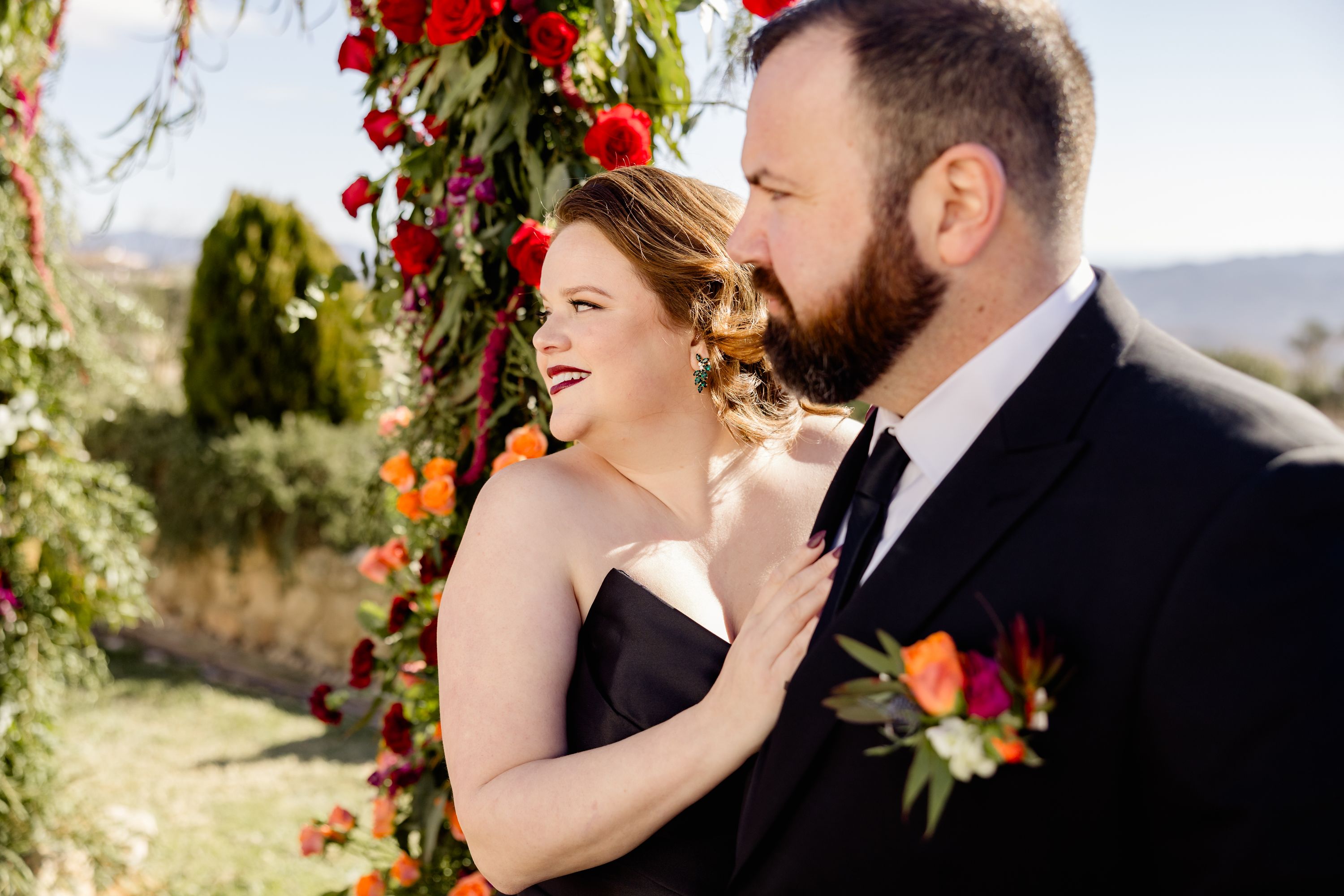 bride and groom dressed in black