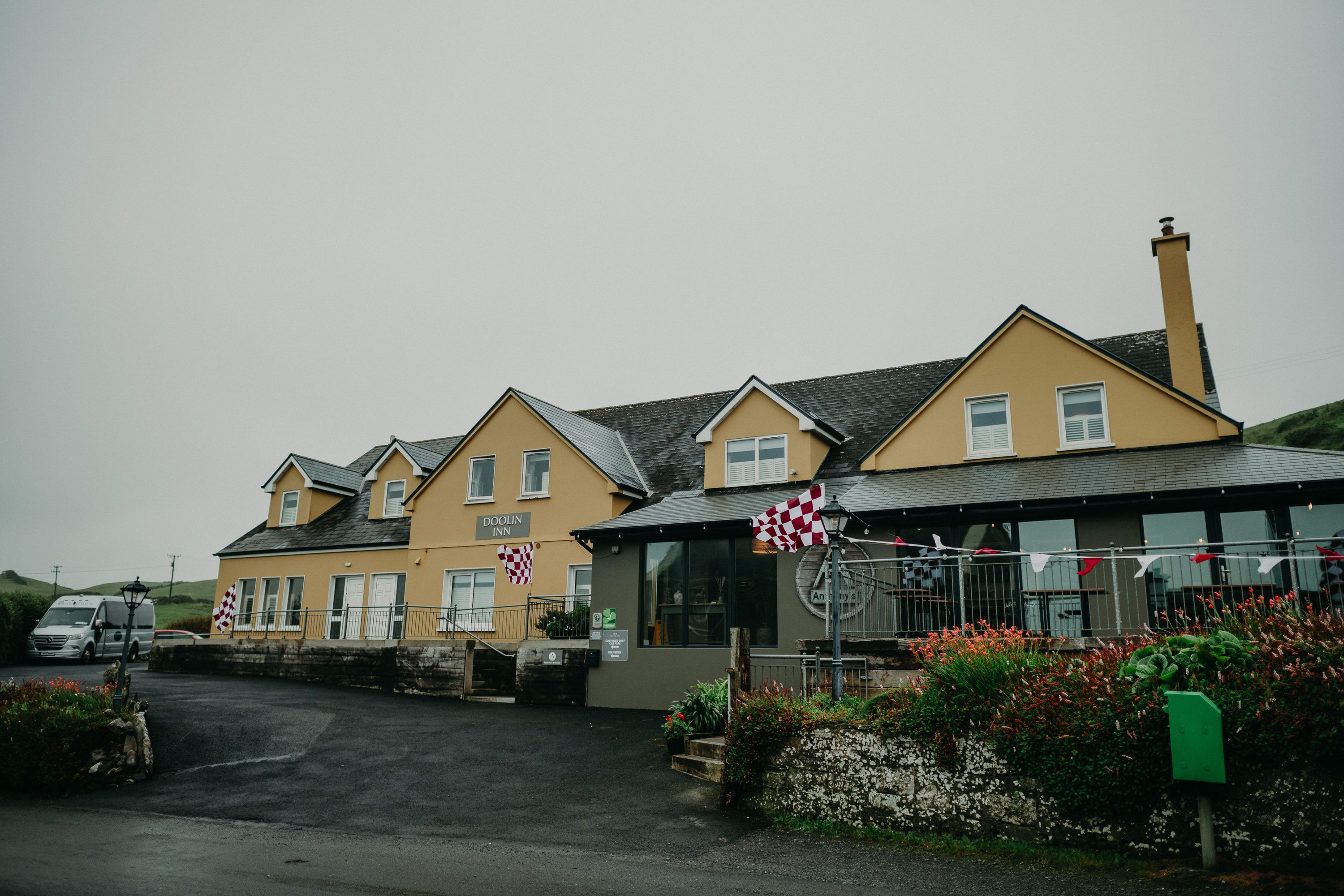 Doolin Inn exterior on a rainy day, a charming accommodation for a small wedding in Ireland