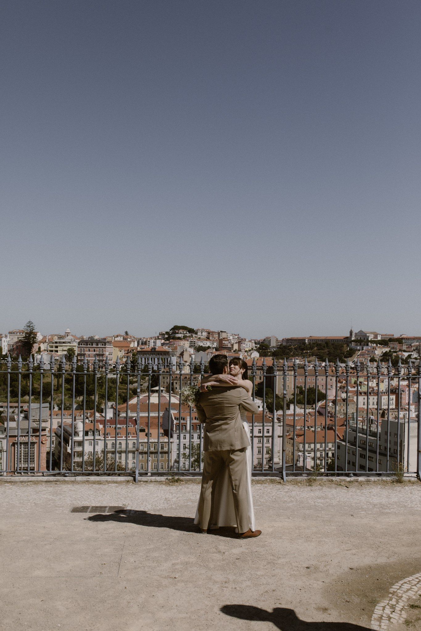 Bride and groom hug during their first look before the ceremony of their micro wedding in Portugal
