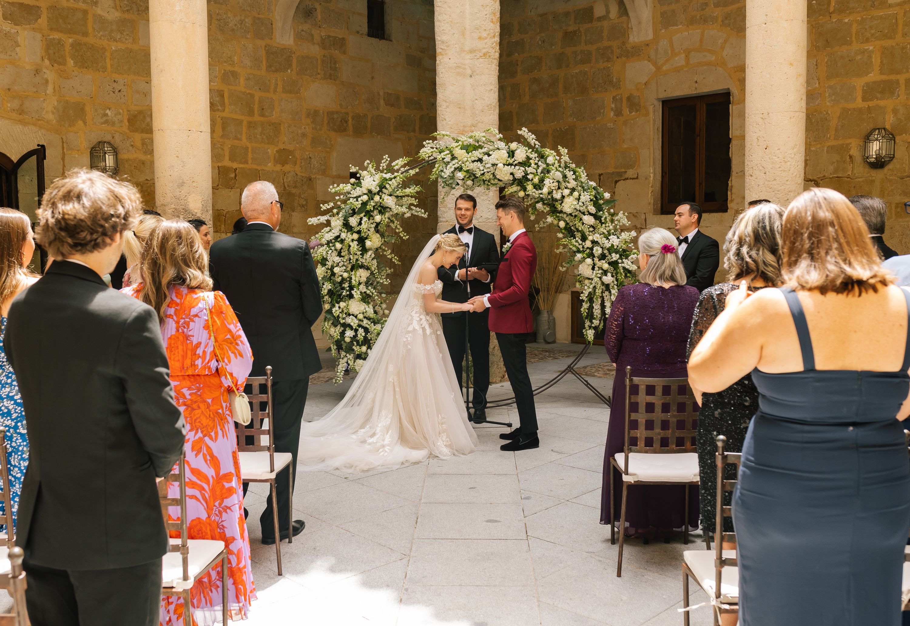 s during the light moment of the ceremony during their small wedding in Spain